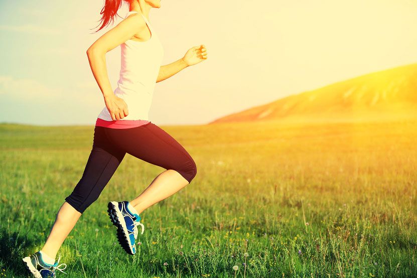 A woman running with proper form